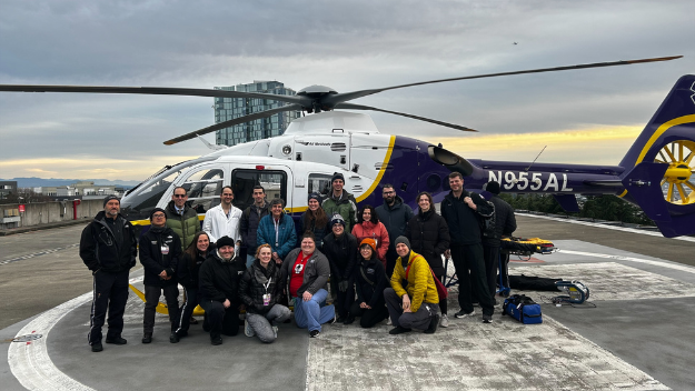 Some of the ECMO Transport team at the HMC helipad (Montlake ECMO Coordinators, HMC ECMO physicians)