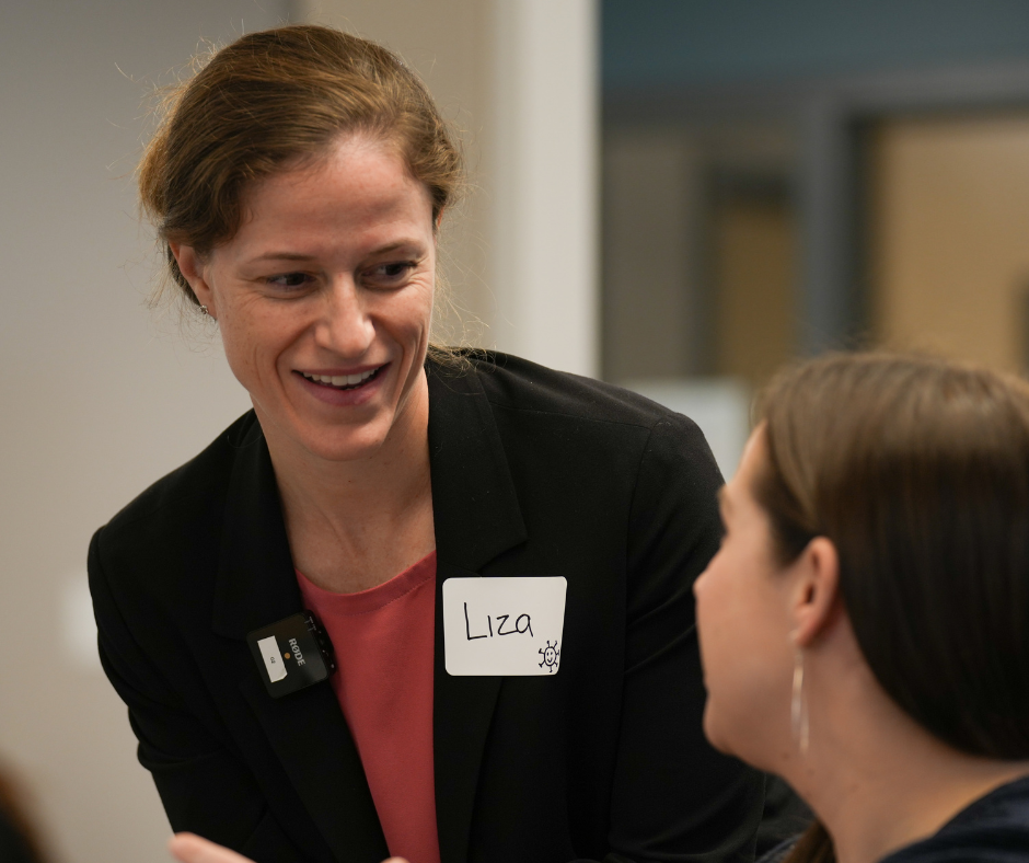 Dr. Rosenman speaks to a participant at a past TIPS training