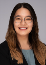 Headshot of Chloe Asato against a light gray background