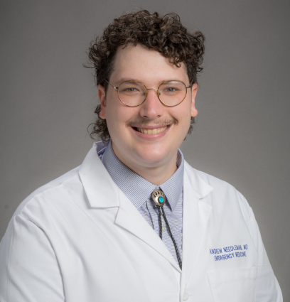 Dr. Ash Needleman