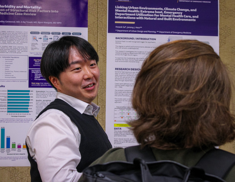 Research students present their posters during the poster session of the Research Showcase