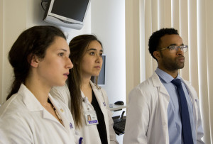 A group of medical students pay attention during a lecture