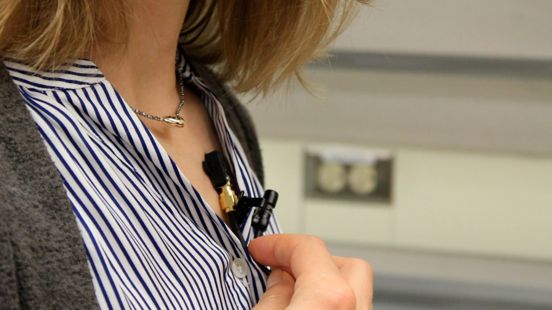 Dr. Khoklova demonstrating how the device sensors will be placed on a patients chest.