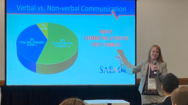 Dr. Marie Vrablik presents her study to a crowd at SAEM Conference