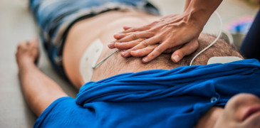A stock photo of someone giving CPR